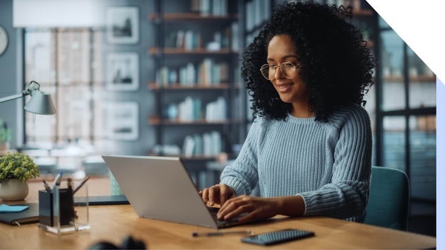 Woman working at a laptop