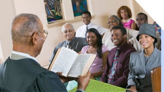 Minister gives sermon to smiling congregation