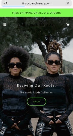 Coco and Breezy A photo of two young women in black sunglasses and slick outfits. There's a "Revive Our Roots" title.