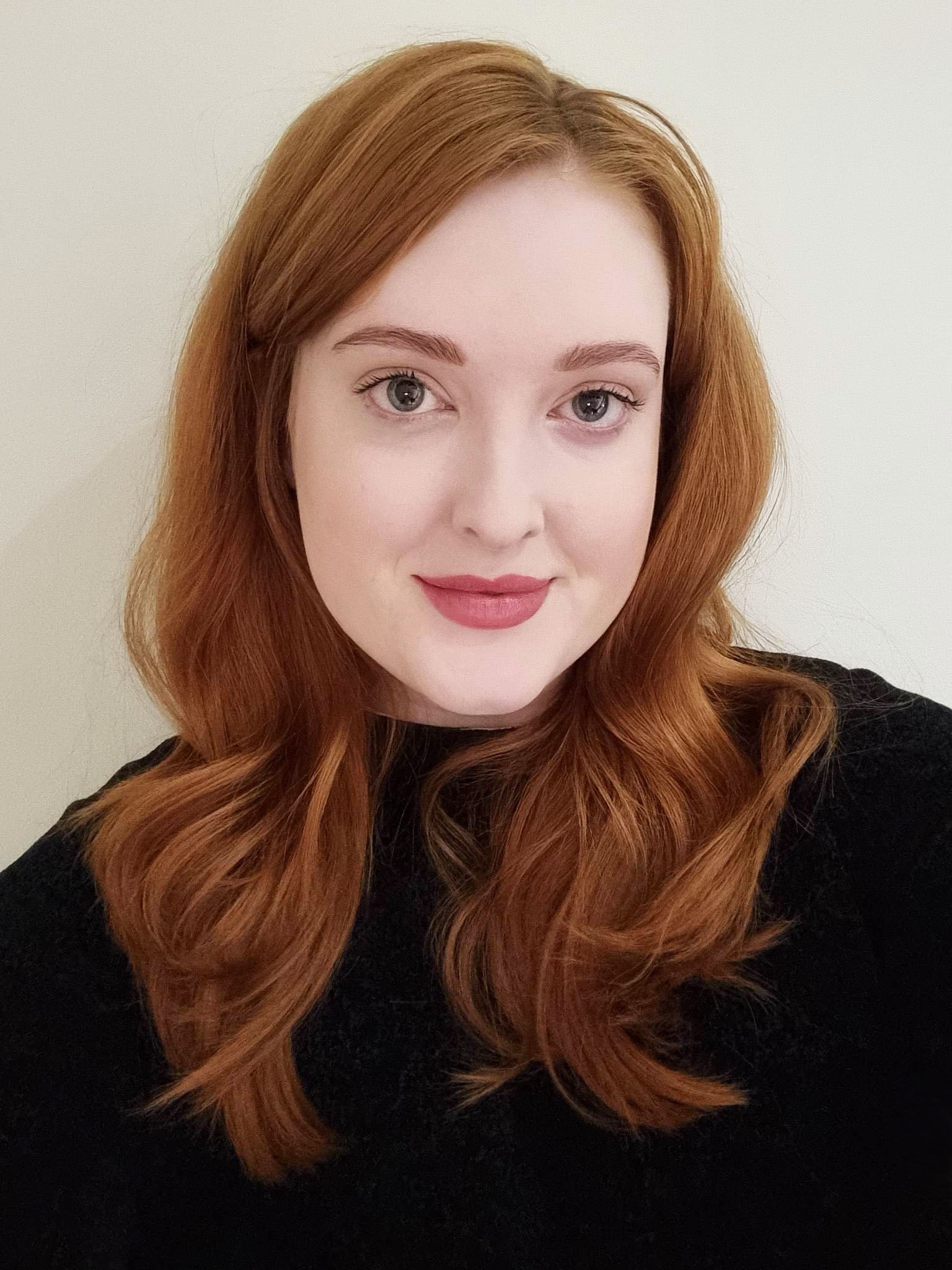 ffion blog as a job 2 portrait headshot of a red-haired woman with a black top
