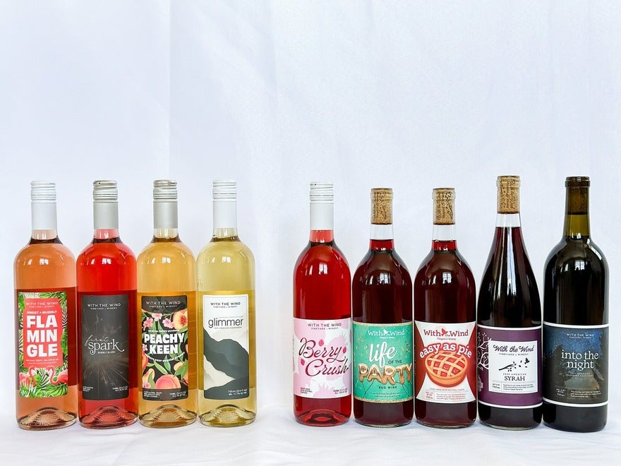 With the Wind wines Line up of wine bottles by With the Wind