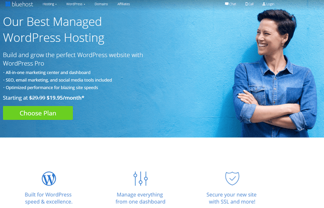 Bluehost Managed WordPress Hosting bluehost wordpress hosting page on lbue with smiling short-haired woman woth arms crossed