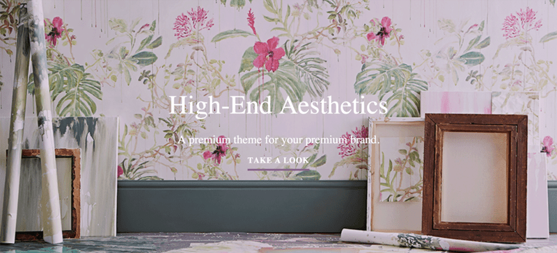 a floral, baroque wallpaper in pink and green website