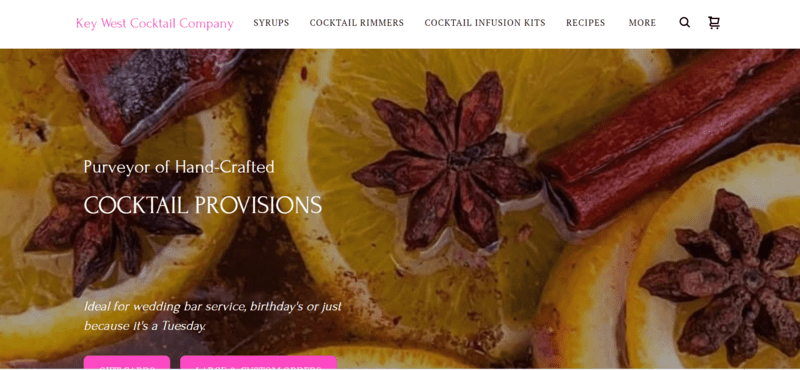 key west cocktail company (1) homepage for cocktail website featuring cut oranges and spices
