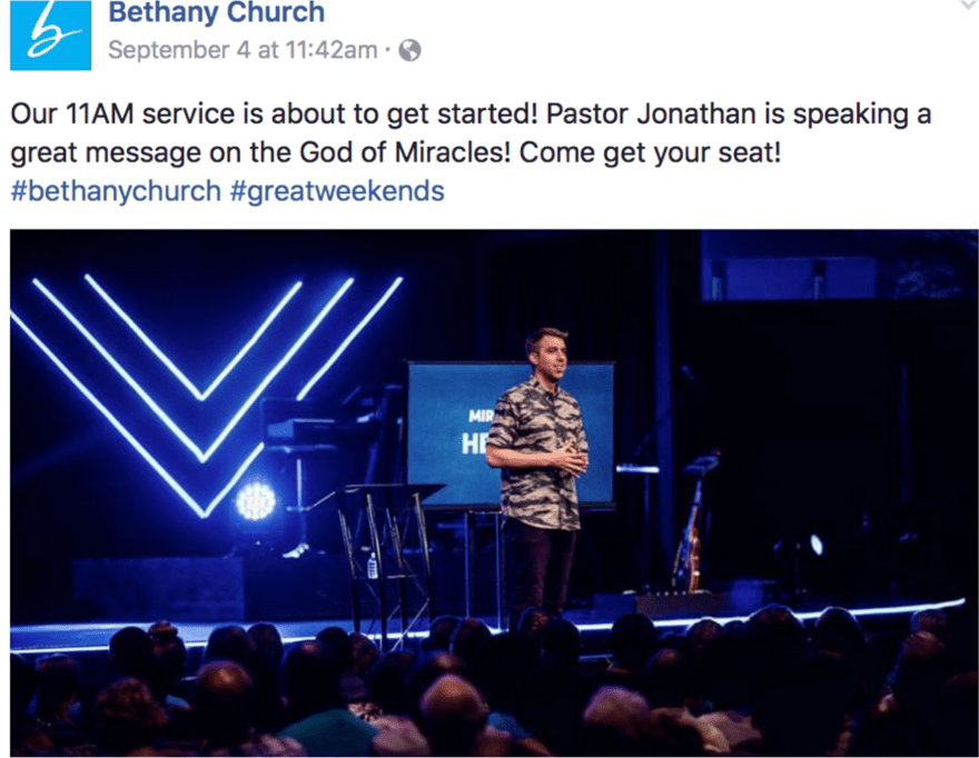 Someone giving a speech at a church Social media post from Bethany Church announcing an 11AM service with Pastor Jonathan about to speak on the God of Miracles in front of an audience.