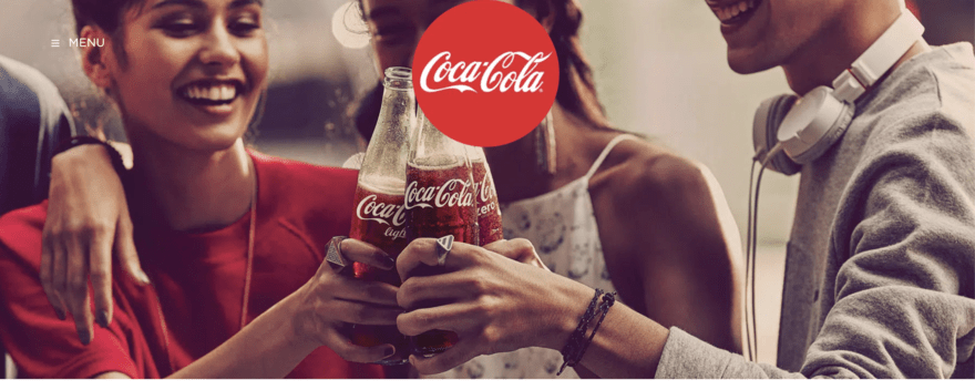 Coca-Cola Coca-Cola website with image of three people cheering Coca-Cola bottles