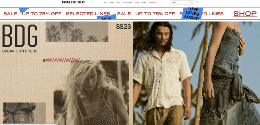 Urban Outfitters website page with images of men and women in white tribal shirts and jean dresses