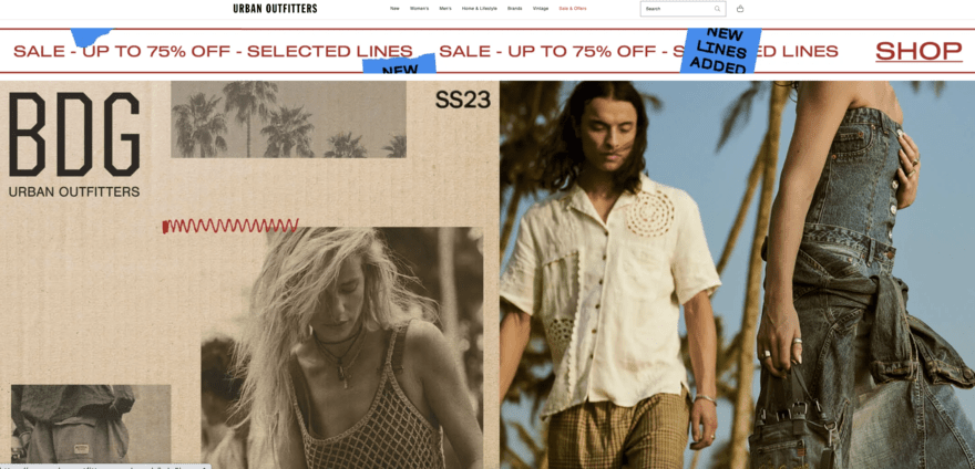 Urban Outfitters Urban Outfitters website page with images of men and women in white tribal shirts and jean dresses